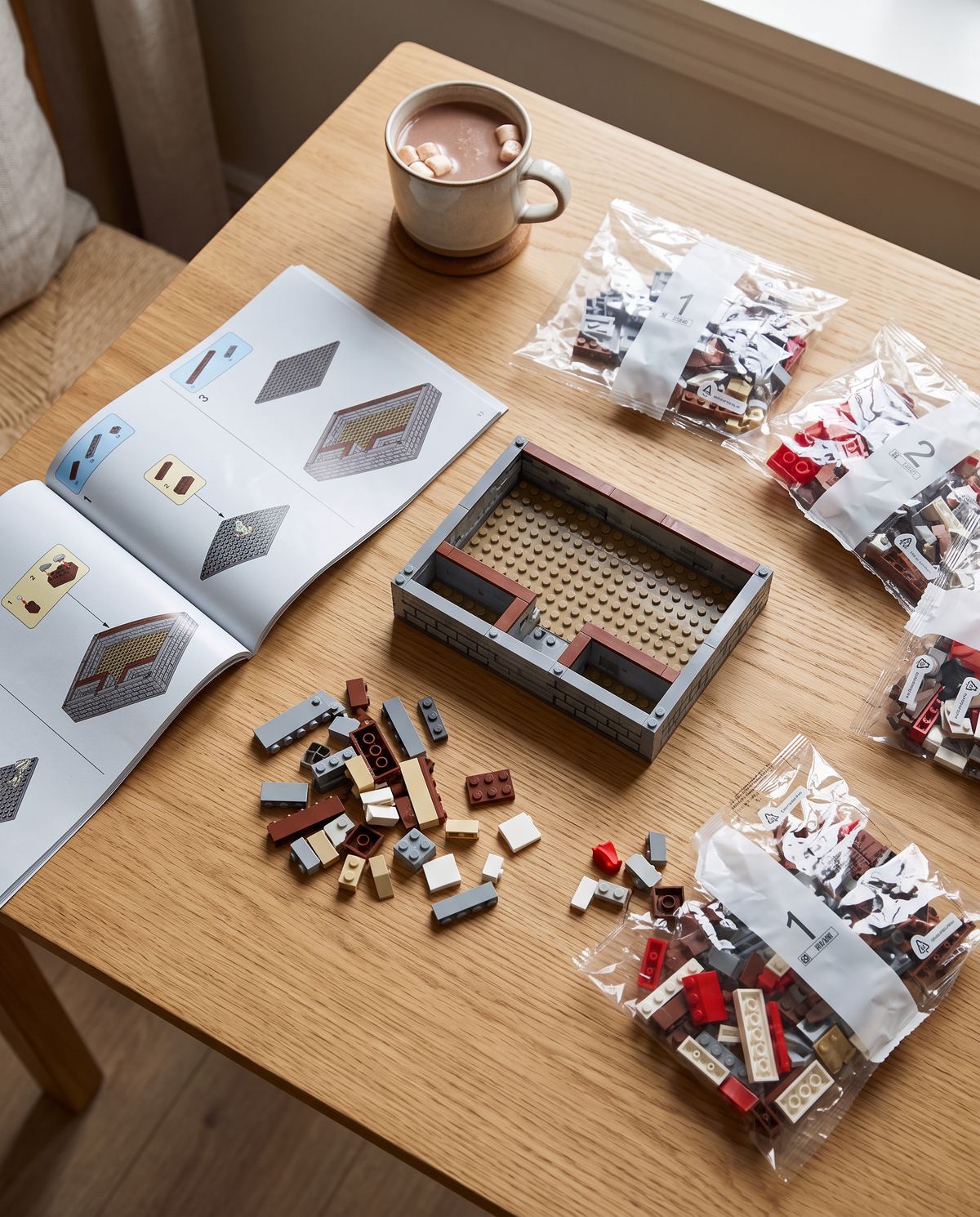 Starting the build with numbered bags and the instruction booklet