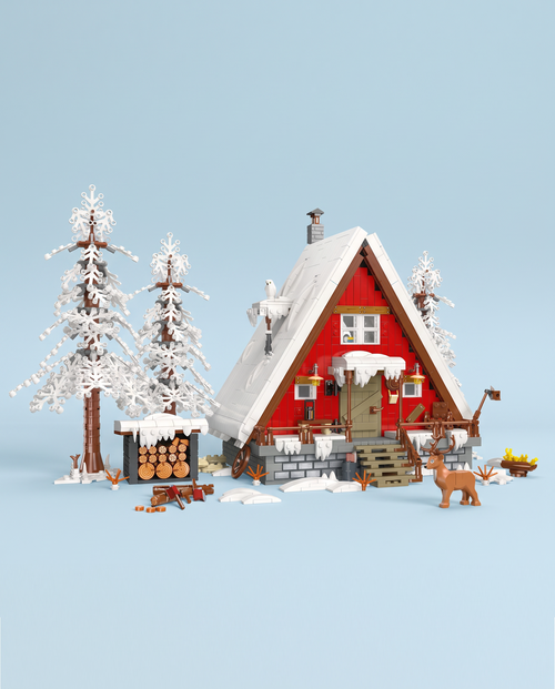 Snowy Christmas cabin building set on a powder-blue background