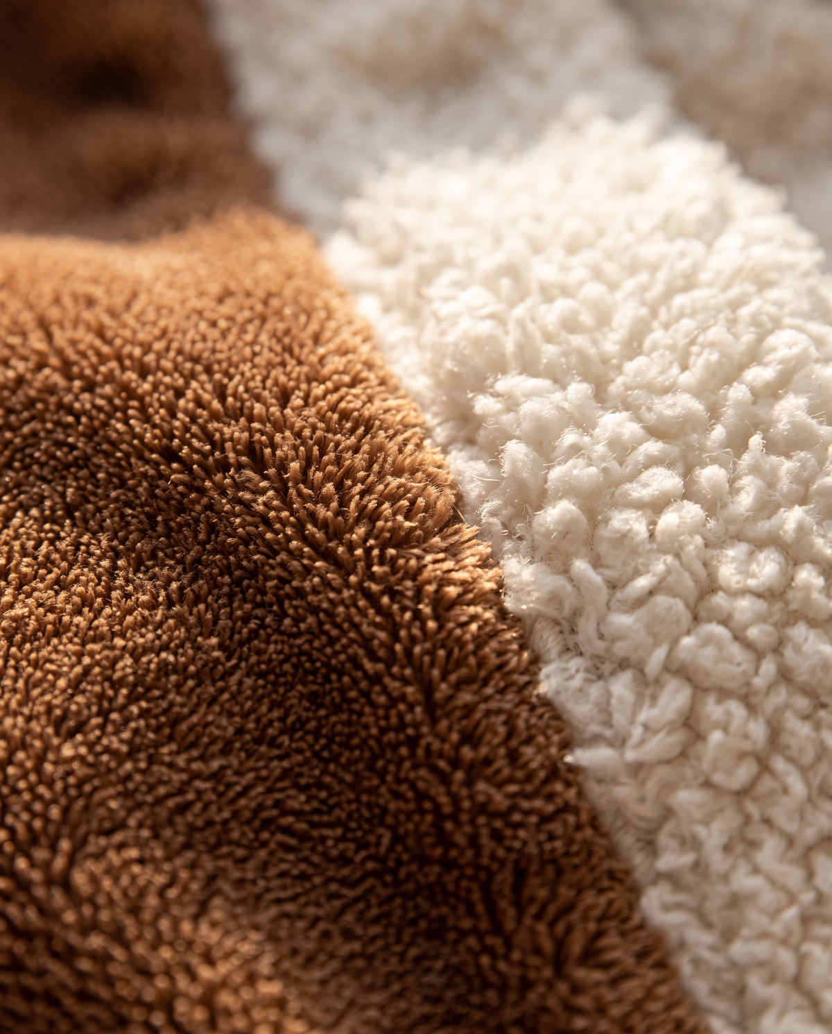 Macro of thick brown plush and white sherpa trim