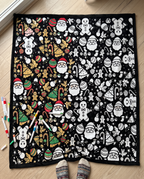 Half colored, half black and white: the Christmas coloring blanket on the floor with markers