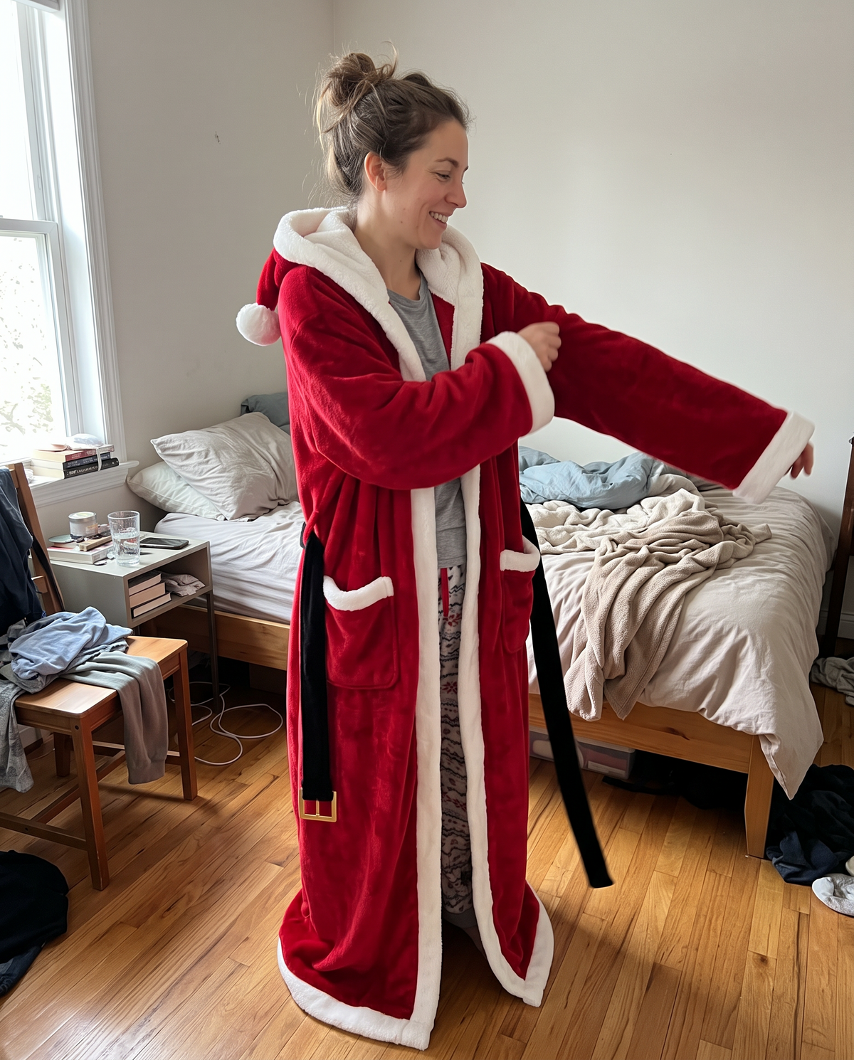 Slipping on the Santa robe over pajamas